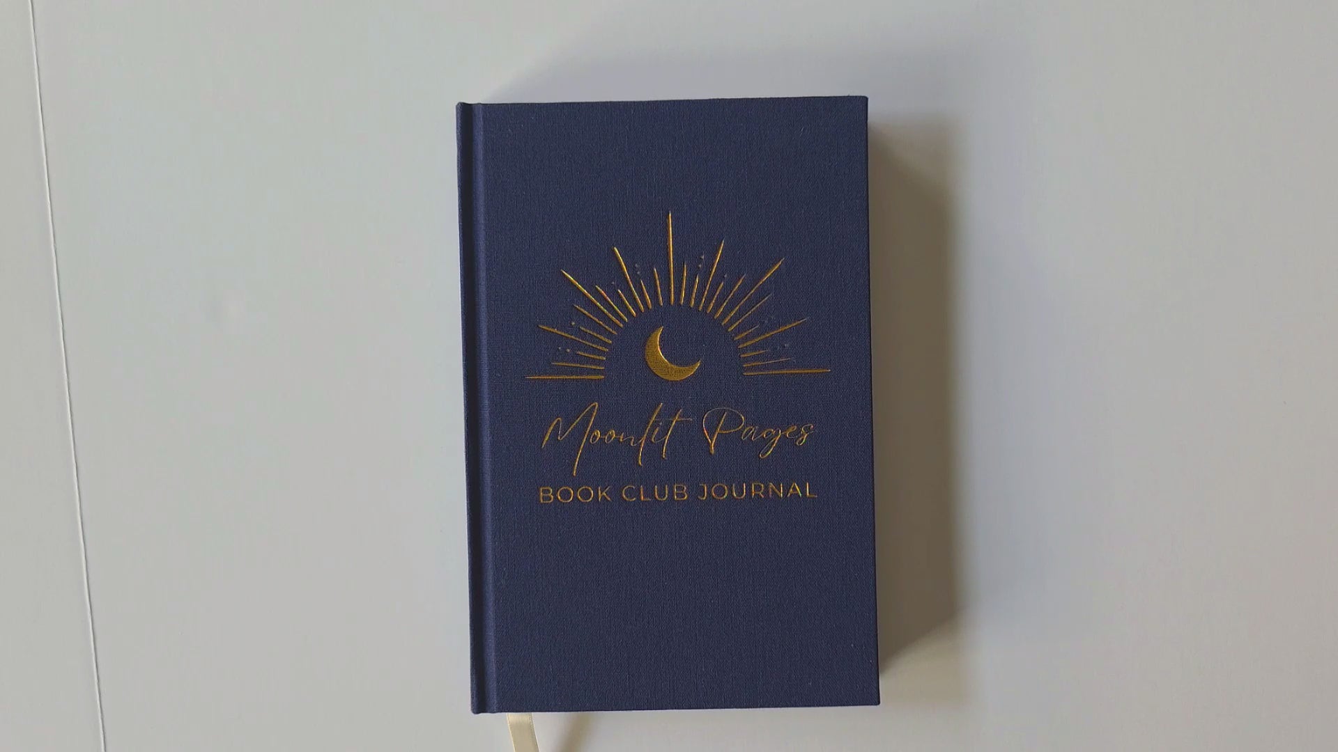 Moonlit Pages Book Club Journal navy hardcover with gold foil moon design